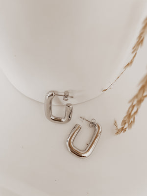 
                  
                    Silver hoops
                  
                