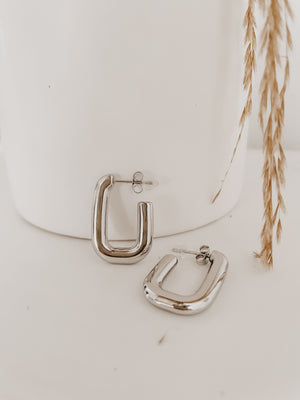 
                  
                    Silver hoops
                  
                