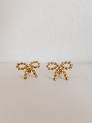 
                  
                    Beaded bow studs
                  
                